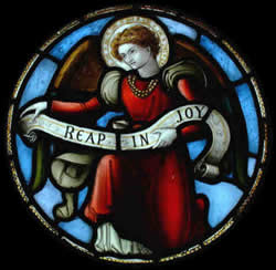 image: Stained glass window; "Reap In Joy"