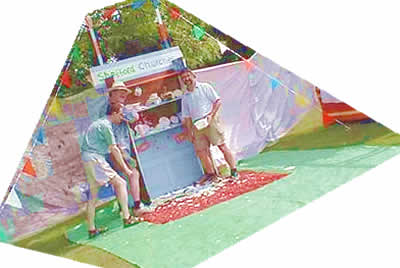 Shefford Churches Plate Smashing Stall, Shefford Gala, 2003. From an original photograph, Copyright Shirley Course, Shefford Methodist Church, June 2003