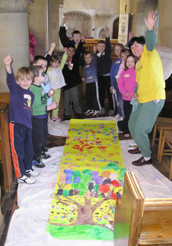 PHOTO: Sparks nearing completion of their giant banner asking "Lord Jesus Let Your Love Grow In Us Today"