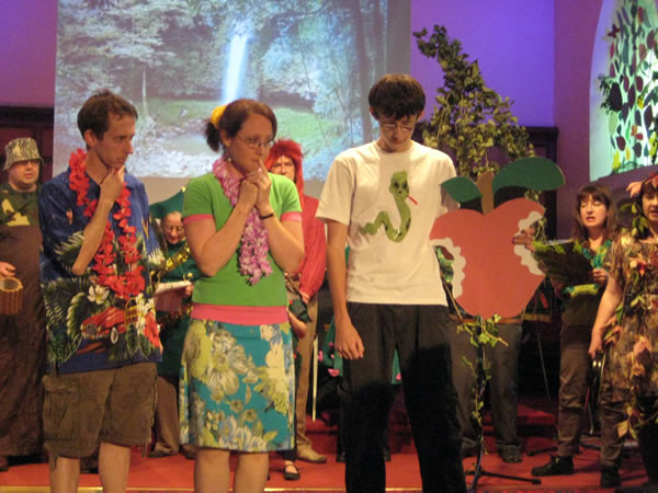 Adam, Eve and the Snake looking guilty...