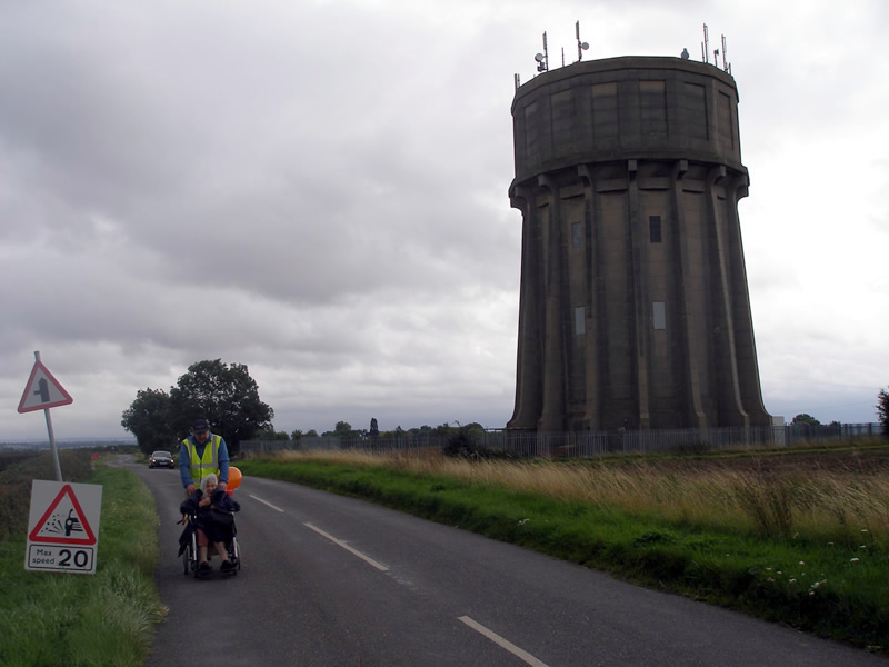 PHOTO: Sparks nearing completion of their giant banner asking "Lord Jesus Let Your Love Grow In Us Today"